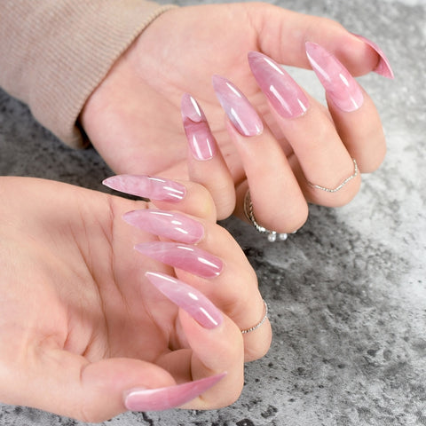 Curved Pink Marble Stiletto Nails