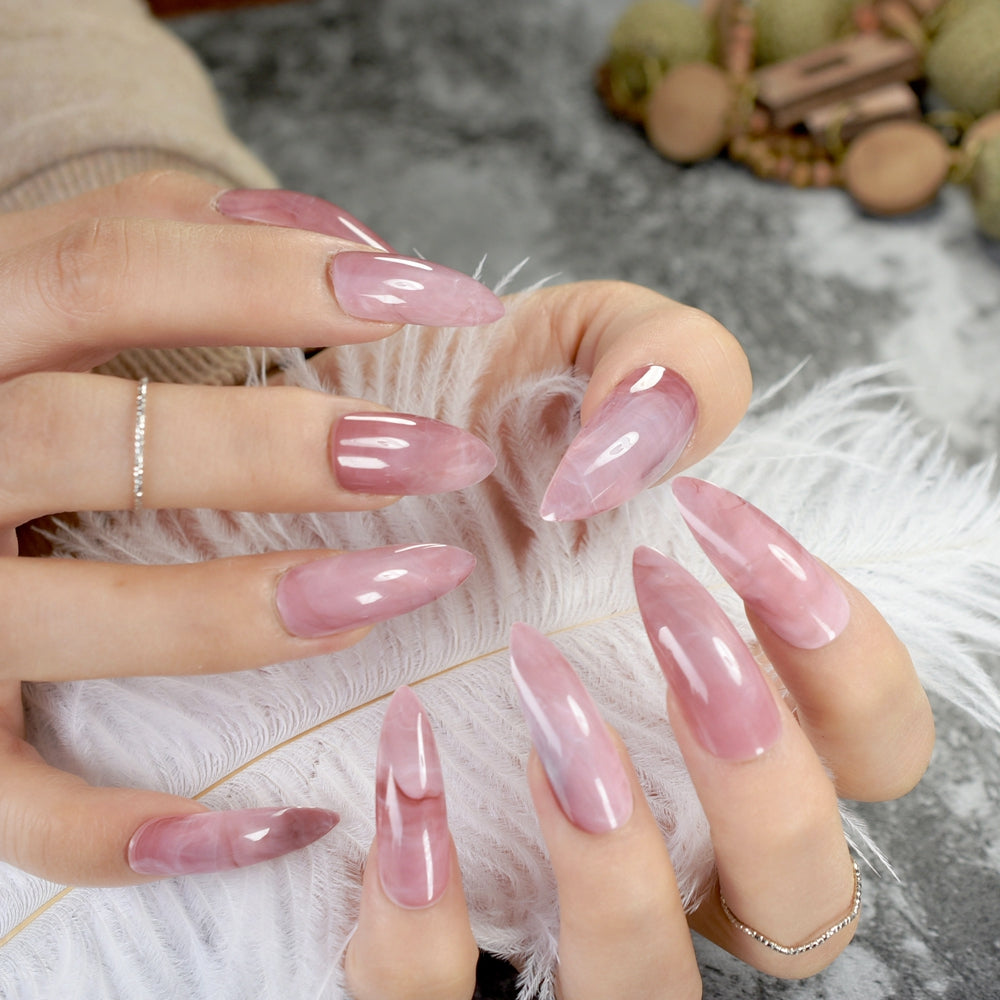 Curved Pink Marble Stiletto Nails