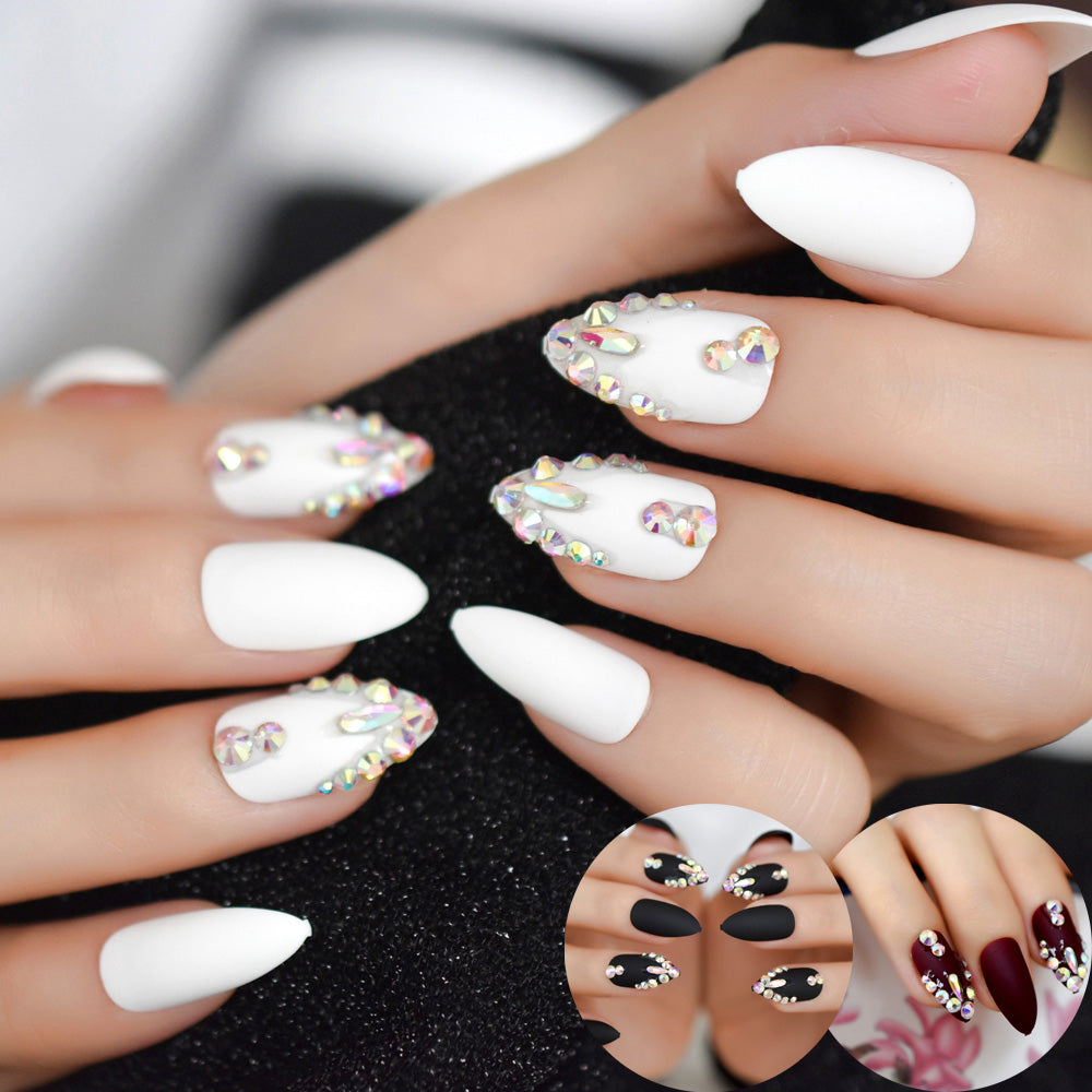 Elegant Almond Nail Inspo with Ornate Crystals